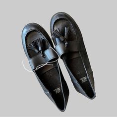 Elevate Your Shoe Game With These Stylish Black Tassel Loafers From Wild Fable's Mallory Collection. The Faux Leather Upper Material Gives These Shoes A Sleek And Sophisticated Look, While The Tasseled Accents Add A Touch Of Bohemian Flair. These Shoes Are Perfect For Any Occasion, Whether You're Dressing Up For A Night Out Or Keeping It Casual During The Day. With Their Versatile Style And High-Quality Construction, These Wild Fable Mallory Loafers Are A Must-Have Addition To Any Woman's Shoe C Black Tassel Slip-on Loafers, Black Flat Tassel Loafers With Brogue Detailing, Black Tassel Loafers With Brogue Detailing For Spring, Black Tassel Loafers For Workwear In Spring, Black Tassel Loafers For Spring Workwear, Casual Black Tassel Loafers With Brogue Detailing, Black Tassel Loafers With Round Toe For Spring, Black Tassel Loafers For Office In Spring, Black Tassel Loafers For Spring Office Wear