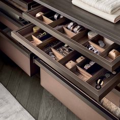 the drawers are open and neatly organized