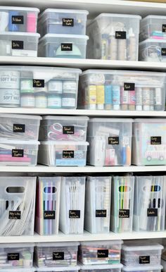 the shelves are filled with craft supplies and storage bins for sewing thread, scissors, markers, and more