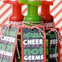 homemade hand sanitizers for christmas with free printable tags on the bottle and tag