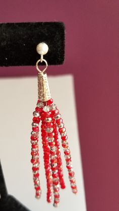 Red and Silver 2mm Swarovski crystals Tassel earrings. Sterling silver findings. There are 2 types of red beads used - opaque and translucent. Sterling silver findings. Types Of Red, Red And Silver, Red Beads, Red Bead, Earrings Sterling Silver, Tassel Earrings, Jewelry Earrings Dangle, Swarovski Crystals, Etsy Earrings