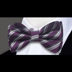 Stripes of Elegance: The Multicolored Stripe Bow Tie Collection Dive into a world of sophistication and style with the Multicolored Stripe Bow Tie Collection – a captivating assortment of bow ties available in a mesmerizing palette of purple, blue, and red. This collection celebrates the timeless charm of stripes, inviting you to embrace a symphony of colors that redefine the art of dapper dressing. Available as self-tie bow ties, each piece tells a unique story of elegance and versatility. A Sy Elegant Purple Bow Tie For Party, Elegant Multicolor Bow Tie, Elegant Fitted Multicolor Bow Tie, Charcoal Gray Suit, Light Blue Dress Shirt, Tie Collection, Silk Bow Ties, Blue Shirt Dress, Tie Bow