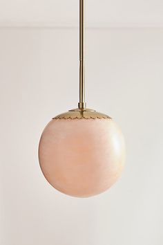 a light fixture hanging from a ceiling in a room