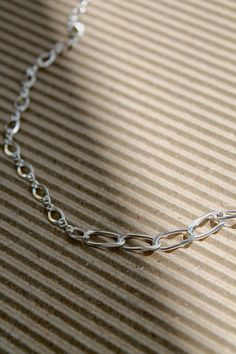 When you can't decide which chain to wear, why not wear both? This DUO CHAIN NECKLACE has a Figure 8 Chain and a Beveled Drawn Oval Curb Chain, each making up roughly half of the necklace. If you like a thinner chain, check out the DUO CHAIN NECKLACE (THIN). Sold individually 16" long with a 2" 24K White Gold Filled extender chain 4.3mm Figure 8 Chain 5.6mm Beveled Drawn Oval Curb Chain 9 grams in weight Please expect slight imperfections, as this necklace is made and assembled by hand The Duo, Figure 8, Curb Chain, Gold Filled, Chain Necklace, Fine Jewelry, Im Not Perfect, White Gold, Sterling Silver