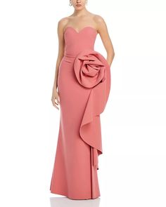 Celebrating Chiara Boni La Petite's legacy of luxury Italian design, this striking gown emulates the florals you'll see on the Tuscan countryside. Sweetheart neck Strapless Seamed waist Oversized rosette detail at left hip with cascading drape to hem Side zip closure Raw-edge hem for ease of tailoring Fits true to size, order your normal size Fitted at the bust, waist and hip Stretchy fabric Designed for a floor-length look Approx. 62" from high point of shoulder to hem, based on a size 4 Model measurements: 5'10" height, 33.5" bust, 23.5" waist, 34.5" hips, wearing a size 4 Tuscan Countryside, Chiara Boni, One Shoulder Gown, Strapless Gown, Mermaid Gown, Long Sleeve Sweater Dress, Gowns With Sleeves, Lace Gown, Sweetheart Neck