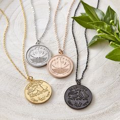 Item Description A piece of history, a piece of culture, and a gorgeous statement piece, all in one. Take yourself back home with a piece of authenticity with our hometown coin necklaces, replicated in the exact aesthetic of each beautiful country's design. Materials & Warranty Material: Stainless Steel, dipped in real 18 Karat Gold. Hypoallergenic | Sensitive Skin-Friendly Chain Length: 16 inch chain + 6 inch extension (22 inches total) | 41-56 CM. Extensions are available here Pendant Size Map Necklace, Mini Hoop Earrings, Country Design, Necklace Women, Drawstring Pouch, Coin Necklace, Earrings Photo, Favorite Things Gift, Chain Length