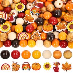 a pile of assorted fall themed wooden beads