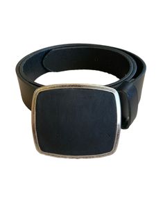 The black genuine leather belt buckle is designed in an antique silver finish. The solid buckle is designed with high quality leather. The belt is not included but may be purchased for an additional cost. The buckle fits belts up to 1 1/2 inches or 38 mm wide.  Buckle dimensions are 3 1/8 inches x 2 inches. Every buckle is packaged in an organza bag which is great for gift giving or storage. Cowboy Buckle, Cowboy Belt Buckles, Leather Belt Buckle, Western Belt Buckles, Western Belt, Discount Jewelry, Western Belts, Genuine Leather Belt, Suspender Belt