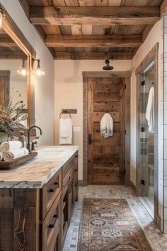 a large bathroom with wooden floors and walls