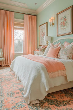 a bedroom with pink and blue decor on the walls, carpeted floor and bed