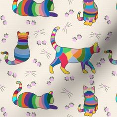 multicolored cats and paw prints on a white background with pink, blue, green, yellow, red, orange, purple, black