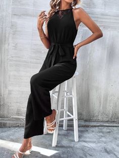 Unleash your elegance with our Solid Belted Halter Elegant High Waist Jumpsuit. This stunning jumpsuit features a plain design with a contrast lace detailing, creating a perfect blend of sophistication and style. The long, wide leg jumpsuit is crafted from non-stretch polyester fabric, ensuring durability and comfort. The high waistline and belted detailing accentuate your curves, making it perfect for any occasion. The halter neckline and sleeveless design add a touch of femininity to the overa Fashionable Jumpsuits, High Waist Jumpsuit, Comfy Jumpsuits, Clean Body, Plain Design, Jumpsuit Fashion, Halter Neckline, Wide Leg Jumpsuit, Polyester Fabric