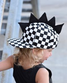 Check out our checkered hat that has some fashion spikes on top! These spikes are soft and can't poke or hurt! Don't forget to straighten spikes when opening package and putting on your Kids head We have 2 sizes Infant/toddler 0-3 years Youth kids 3-teenage Punk Cap Hat One Size Fits Most, Punk Style Cap One Size Fits Most, Punk Style Cap Hat, Trendy Adjustable Cap Costume Hat, Trendy Adjustable Cap Costume Headpieces, Playful Black Baseball Cap With Curved Brim, Playful Adjustable Baseball Cap, Fun Adjustable Hats For Play, Fun Adjustable Hat For Play