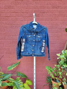 Women's Denim Jacket size .  Please see photo's for measurements. Restyled with patches of rescued textiles. 🧺 CARE INSTRUCTIONS 🧺 To keep the jacket in beautiful condition, please Machine wash in COLD, tumble dry or lie flat to dry. 📬 Ships from my home studio in Center Valley, PA, via USPS with tracking. ✨ I am not responsible for packages once they have been scanned in at the Post Office. I have no control over USPS shipping delays, losses, or damages. I do not refund or replace for USPS i Fitted Recycled Denim Outerwear For Fall, Fitted Recycled Denim Jacket For Fall, Fitted Long Sleeve Denim Jacket In Recycled Denim, Recycled Denim Long Sleeve Outerwear For Fall, Long Sleeve Recycled Denim Outerwear For Fall, Fitted Dark Wash Recycled Denim Outerwear, Dark Wash Denim Jacket With Patches For Fall, Recycled Denim Outerwear With Patches For Fall, Fall Recycled Denim Outerwear With Patches