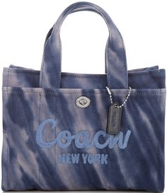 From COACH&#x2C; the Cargo 26 Tie Dye Tote Bag feaures: Carry as much (or as little) as you like with our lightweight Cargo tote. Detailed with our cursive Coach script embroidery and iconic turnlock closure&#x2C; this compact 26 has an open interior with room for an iPad&#x2C; two outside pockets for easy organization and a removable webbing strap for shoulder or crossbody wear. Specially tie-dyed with our sophisticated spin on the classic pattern&&# Tie Dye Tote Bag, Script Embroidery, Glute Workout, Brand Accessories, Webbing Strap, Easy Organization, Pretty Bags, Recycled Leather, Classic Pattern