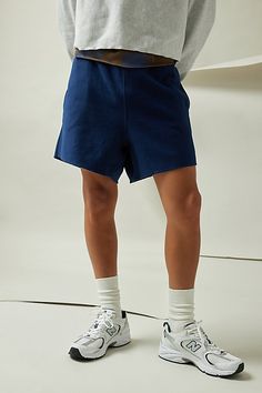 Relaxed fit cotton poly shorts by Champion in the signature reverse weave fabrication. Elastic waistband shorts with an adjustable drawstring tie. Shorts include side pockets and cutoff hems. Urban Outfitters exclusive. Features Champion UO Exclusive reverse weave 5" cutoff short Relaxed fit shorts Elastic waistband Adjustable drawstring Side pockets Cutoff hem UO exclusive Content + Care 82% Cotton, 18% polyester Machine wash Imported Size + Fit Model in Navy is 6'0" and wearing size Medium Mea Cotton Athleisure Bottoms With Boxy Fit, Boxy Fit Cotton Athleisure Bottoms, High-waisted Cotton Athletic Shorts With Drawstring, Cotton Sports Shorts With Drawstring, Cotton Drawstring Sports Shorts, Relaxed Fit Cotton Athletic Shorts For Loungewear, Sporty Bermuda Shorts With Relaxed Fit For Loungewear, Cotton Sports Bottoms For Summer, Summer Sports Cotton Bottoms