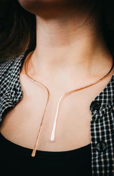 This beautiful necklace is a new, dramatic version of our Hammered Collar Necklace. We form a single piece of metal into an asymmetrical shape that is inspired by our Sunburst Necklace. The metal is flattened in the front and the length measures approximately 9″ at the longest piece. Choose from 14K GOLD FILL, 14K ROSE GOLD FILL, or STERLING SILVER. This necklace can be great for everyday wear or for a special evening out. It’s simple, clean and incredibly eye-catching. This necklace makes a gor Rose Gold Drop Jewelry For Party, Modern Rose Gold Metal Necklace, Unique Rose Gold Metal Necklace, Elegant Hand Forged Choker Necklaces, Elegant Adjustable Hand Forged Necklaces, Elegant Hand Forged Drop Jewelry, Rose Gold Lariat Necklaces For Party, Rose Gold Lariat Necklace For Party, Rose Gold Long Drop Necklace Gift