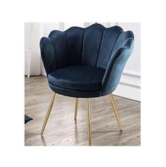 a blue chair sitting on top of a wooden floor next to a white wall and window