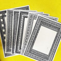 five black and white frames on a yellow background