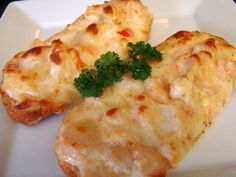 three pieces of pizza on a plate with parsley sprinkled in cheese and broccoli