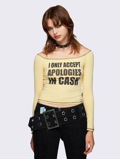 Add a splash of Y2K nostalgia and slogan mania to your wardrobe with our playful Yellow Off the Shoulder Top. Find more edgy grunge slogan graphic tops and cold shoulder tops at Minga London. Shop now! Y2k Nostalgia, Minga London, Edgy Grunge, Cold Shoulder Tops, Punk Princess, Instagram Help, 40 Dress, Cargo Jacket, Shoulder Tops