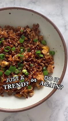 a white bowl filled with food on top of a marble countertop and the words, just a friend or do it again?