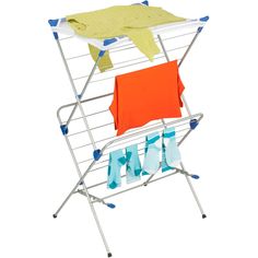 an ironing board with clothes on it and a yellow towel hanging from the top