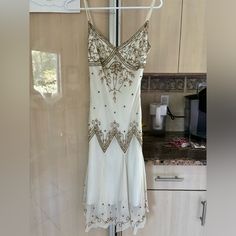 Adrianna Papell White Dress With Gold Beading. Zipper On The Side. Comes With Extra Beads. Never Been Worn. Size 2 White Dress With Gold, Gold Beaded Dress, Adrianna Papell Dresses, Adrianna Papell, Beaded Dress, Gold Beads, Beading, Colorful Dresses, White Dress