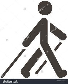 a black and white silhouette of a person walking with skis on their feet stock photo