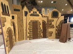 a cardboard castle made to look like it is being built