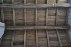 the ceiling is made out of wooden planks