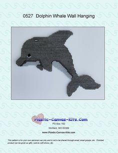 an image of a dolphin made out of fabric with the words dolphin whale hanging on it