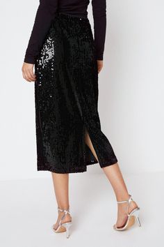 From everyday midis to flirty minis, in a wide range of fabrics and prints, our skirts will flatter every silhouette. Think printed satin, black leather and monochrome tweed; whatever you're looking for, our skirt edit has all the best styles. Style: Velvet Sequin Midi Skirt.  Ideal for: Christmas.  Design: Sequin.  Model wears size UK 10 and is 5' 9" tall. Sequin Midi Skirt, Oasis Fashion, Fashion Face, Christmas Design, All The Best, Oasis, Cool Style, Midi Skirt, Fashion Beauty