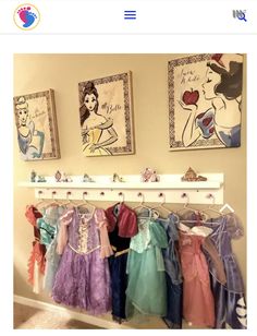 there are many princess dresses hanging on the wall