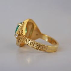 Introducing the "Emerald Scarab Ring" – a captivating blend of ancient Egyptian mystique and timeless elegance. Centered with a lush emerald framed by intricate Islamic patterns inspired by Egypt's architectural wonders, this ring evokes the opulence of ancient Egypt. Flanked by scarabs symbolizing rebirth, each holds a radiant diamond, echoing the sun's eternal sparkle on the Nile's waters. All orders come in our Tippy Taste ring box. This ring is handmade and designed in NYC. 14K or 18K solid gold Natural oval emerald, 8*6mm, approx. 1.20ct Natural round diamonds. SI clarity, GH color, 0.06ct total carat weight 3mm ring band ** Tippy Taste Heirloom Collection is made to order. Please allow 3-4 week turnaround time. Shipping:Domestic: Free shippingInternational: Free shippingAll orders ar Scarab Ring, 3mm Ring, Islamic Patterns, Radiant Diamond, Ring Band, Ancient Egyptian, Ring Box, Ancient Egypt, Band Rings