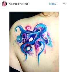 an octopus tattoo on the back of a woman's upper shoulder, with watercolor tattoos