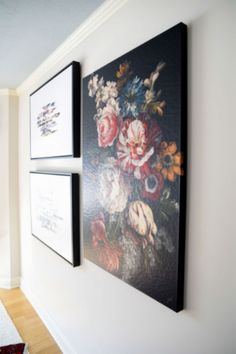 two paintings on the wall next to each other