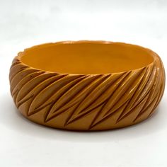 This Bakelite Bracelet Is From My Personal Collection. It Is A Deep Carved Leaf Pattern In The Very Desirable Butterscotch Color. Bakelite Was Developed In 1907 By Leo Baekeland. This Particular Piece Was Given To My Aunt In The Late 50’s By A Member Of The Baekeland Family. They Lived In Our Town. She Was A Typist Which Account For Some Of The Marks On One Side. I’ve Shown Them In Last Photo. It’s Not Uncommon On The Deeply Carved Pieces. The Condition Is Good Vintage. It Measures Approximately To My Aunt, Butterscotch Color, Bakelite Bracelets, Bakelite Jewelry, Our Town, Vintage Bakelite, Leaf Pattern, Bangle Bracelet, Womens Jewelry Bracelets