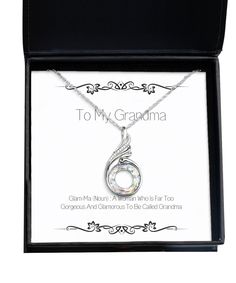 A message from the heart! This Grandma Rising Phoenix piece features .925 sterling silver and is sure to make your loved ones smile with its charm when it arrives gift-ready in our lovely custom packaging! As an added bonus, we include exclusive cards you can proudly display on your shelf or give away as a thoughtful present; these messages express exactly how much you care about each person. When a phoenix rises, it brings hope and a renewed sense of strength. Our Rising Phoenix necklace embraces this spirit. It celebrates the emergence from the past to become wiser, more powerful, and fearless in your future endeavors. Product Features - This Grandma necklace offers eye-catching sparkle with a gorgeous Swarovski crystal and 15 AAAA Cubic Zirconia stones that offer highly graded cut, clar Grandma Necklace, Phoenix Necklace, Cheap Gifts, Custom Packaging, Wedding Jewellery Necklace, Message Card, Grandma Gifts, Wedding Necklace, Swarovski Crystals