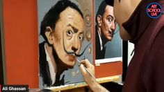 a man is painting pictures on the wall with his face as if he was an artist