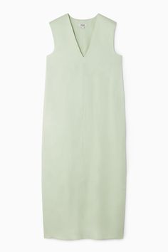 Offered in a fresh mint-green hue, this sleeveless dress is crafted from lightweight linen that's blended with viscose for fluidity and drape. The V-neckline and central seam define the silhouette, while the exaggerated side slits create subtle movement as walk.  Regular fit Shell: 53% Viscose, 47% Linen (excluding trims) / Machine wash Back length of size EU 36 is 128cm / Model wears a size EU 36 Elegant Green Linen V-neck Dress, Luxury Fitted V-neck Linen Dress, Relaxed Fit Linen V-neck Dress For Daywear, Green Linen V-neck Dress, Summer Linen V-neck Slip Dress, Sweetheart Neckline Dress, Gathered Dress, Linen Shirt Dress, Maxi Shirt Dress