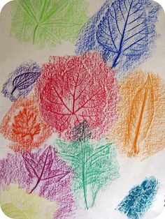 colored leaves drawn on paper with crayons