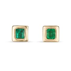 Elevate your style with our exquisite bezel-set emerald earrings, each showcasing mesmerizing Colombian emeralds with a medium vivid green hue and semi-transparent clarity. Crafted in luxurious 18k yellow gold and featuring an elegant latch-back closure, these earrings exude sophistication and timeless beauty, perfect for adding a touch of glamour to any ensemble. Setting Style: Bezel Setting Material: 18K Yellow Gold  Main Stone: Emerald  Count: 2 Shape: Emerald Cut Approx Weight: 1.85-Carats C Elegant Emerald Earrings With Bezel Setting, Formal Emerald Earrings With Birthstone, Formal Emerald Birthstone Earrings, Classic Green Earrings With Bezel Setting, Green Bezel Set Earrings For Formal Occasions, Formal Green Earrings With Bezel Setting, Yellow Gold Bezel Setting Earrings For May Birthstone, Yellow Gold Emerald Earrings With Bezel Setting, Green 14k Gold Earrings With Bezel Setting