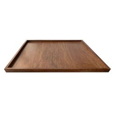 a wooden tray on a white background