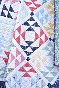 the quilts are all different colors and patterns, but one is not very colorful