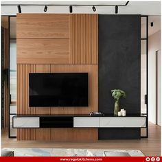 a modern living room with wood paneling and black walls