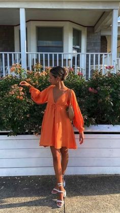 cute girl with an orange summer dress with a great instagram pose Matching Summer Set Outfit, Effortless Vacation Outfits, Beachy Brunch Outfit, April Wedding Guest Dress Casual, Casual Summer Wedding Guest Dress, Lake Town Outfits, Spring Clothing 2024, Colorful Beach Dress, Music In The Park Outfit