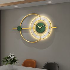 a clock that is on the wall above a table