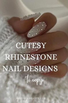 If you ever wanted to try rhinstone nail deisgns and think they are too bold, well here are ideas that are modest and chic Matte Nails Rhinestones, Simple Diamond Designs On Nails, Easy Nail Designs With Rhinestones, White Long Square Nails With Diamonds, French Nail With Glitter Line, Glazed Donut Nails With Rhinestones, Snowflake Nails With Rhinestones, Easy Diamond Nail Design, One Rhinestone On Each Nail