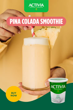 a person is holding a smoothie with a straw in it and the caption reads activa pina colada smoothie